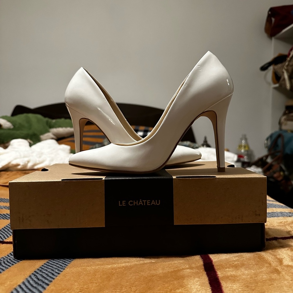 White pointed toe heels